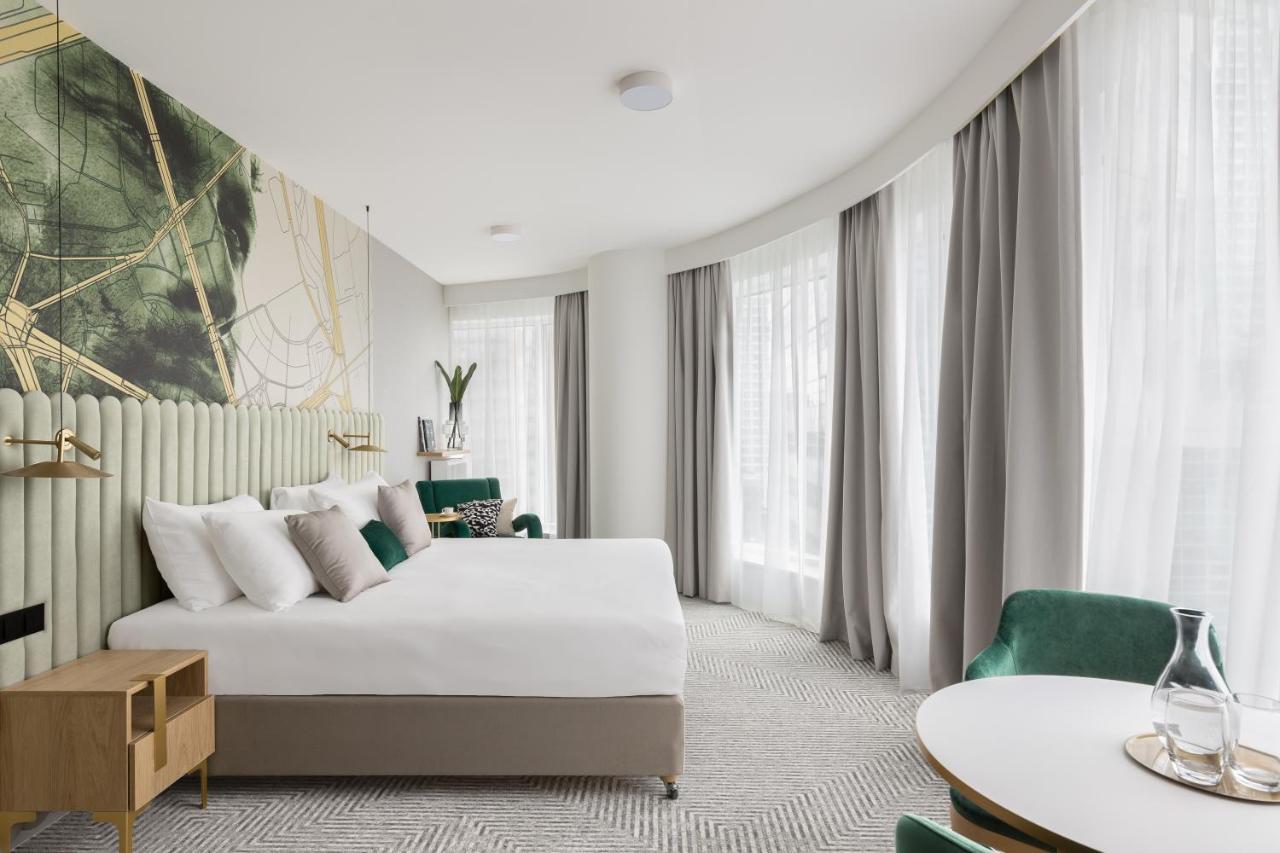 Junior Suite met Hoekzicht - 1 Kingsize Bed