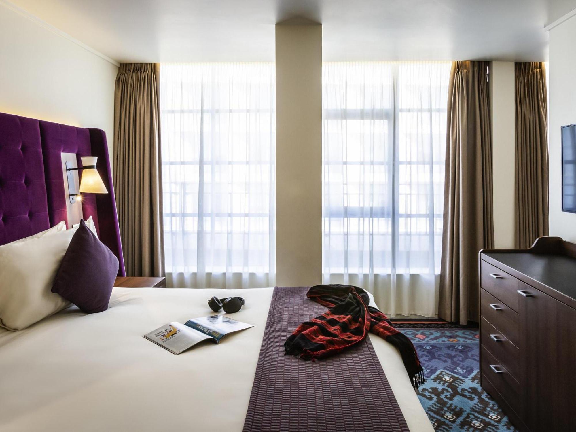 Suite Junior con cama doble grande y sofá cama