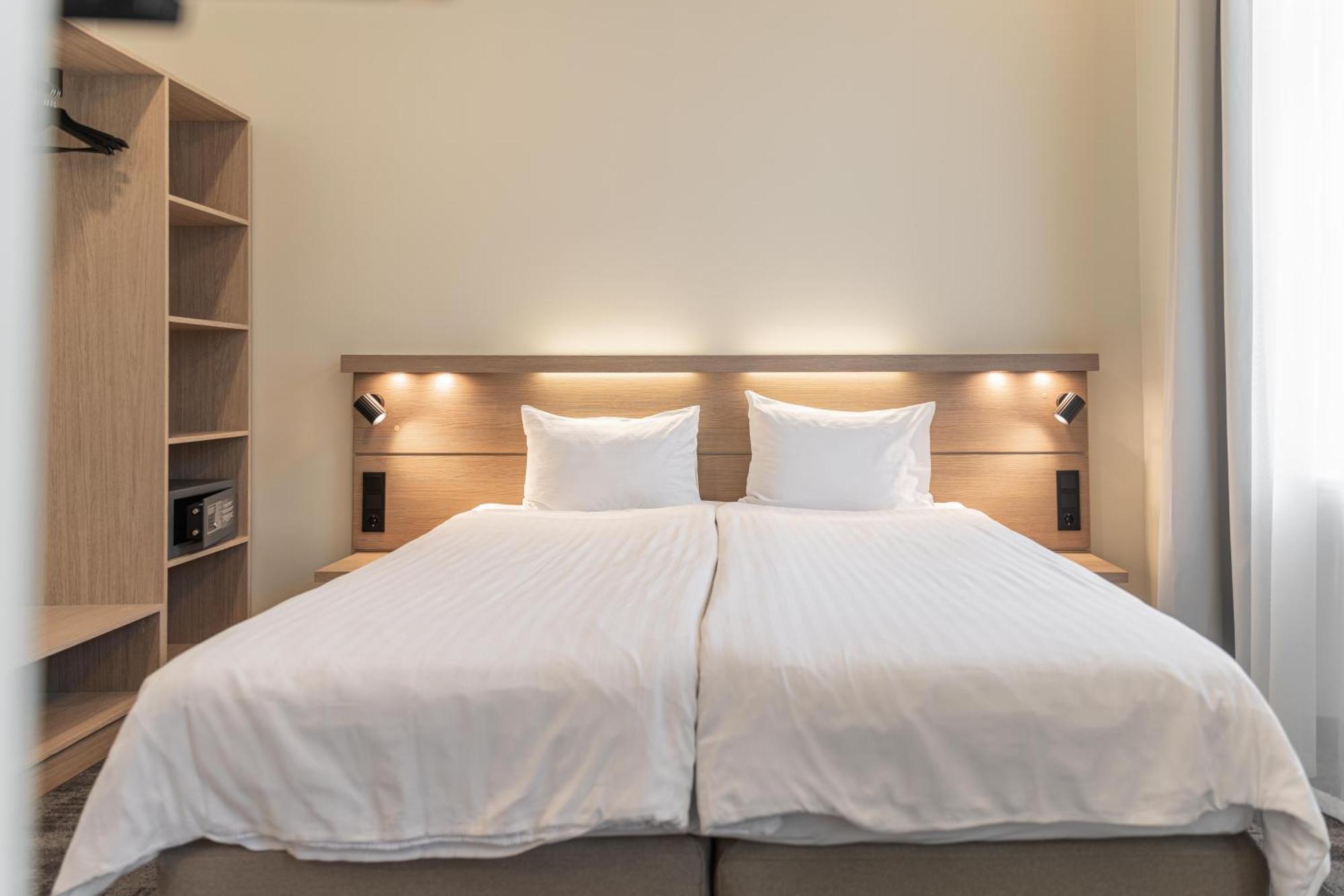 Moderne tweepersoonskamer met 1 of 2 bedden