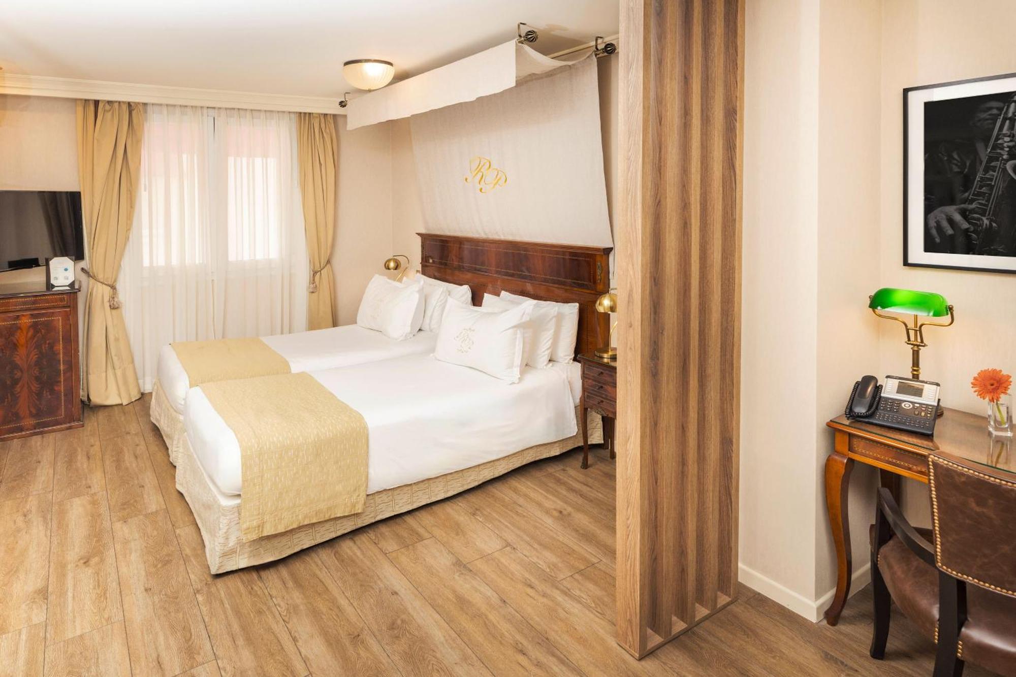 Hébergement Lit King-Size Premium